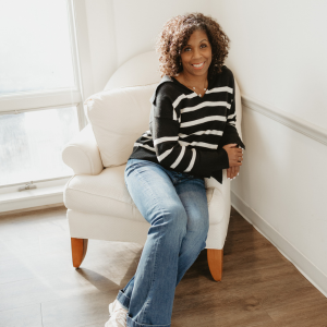 Deirdre Hughes smiling at the camera