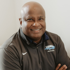 Santosh Mahon smiling at the camera