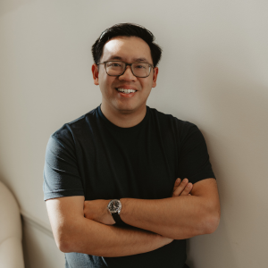 Wornden Ly smiling at the camera