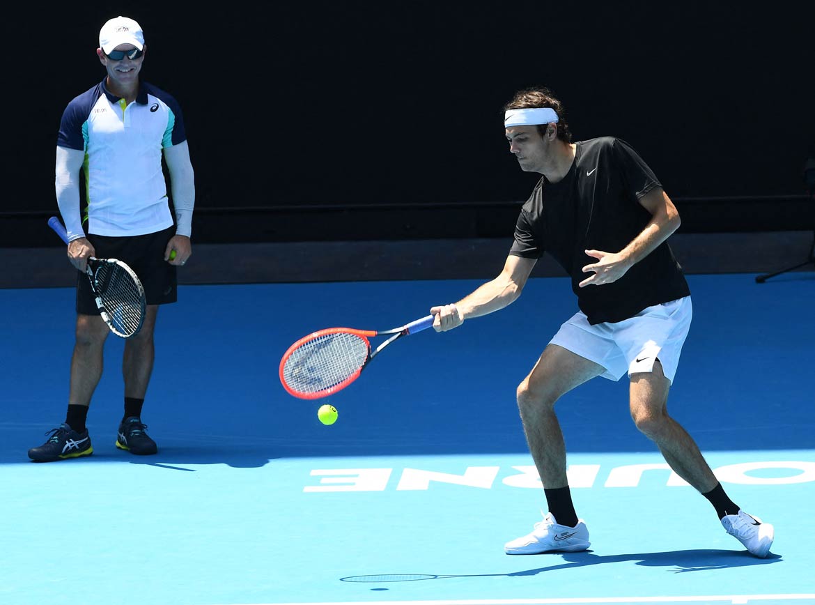 Michael Russell y Taylor Fritz en el 2023 Abierto de Australia. Fotografía de Paul Crock/AFP vía Getty Images.